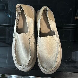 Sanuk slip ons
